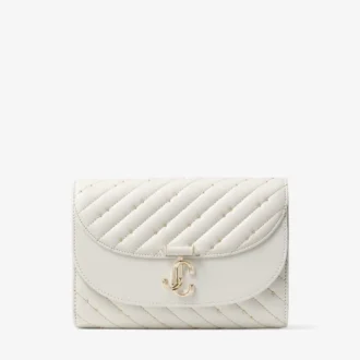 Avenue Curve Clutch – Clutch aus gestepptem Nappaleder in Latte
