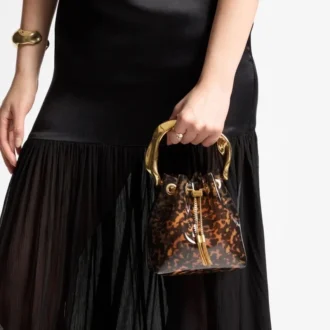 Bon Bon Transparente Bucket Bag in Schildpattoptik mit geformtem Griff