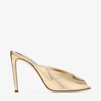 Brigitte Mule 100 – Pantoletten aus goldfarbenem Liquid-Metal-Leder