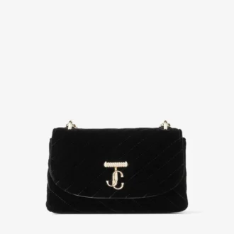 Curve Cross Body Small – Kleine schwarze Umhängetasche aus gestepptem Samt mit Kristall-JC-Bar