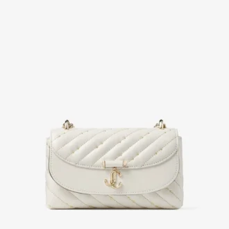 Curve Crossbody Small – Kleine, gesteppte Nappaleder-Umhängetasche in Latte
