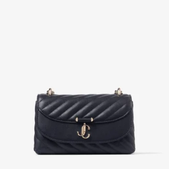 Curve Crossbody Small Marine – Gesteppte Umhängetasche aus Biker-Leder