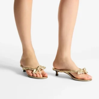 Liss 35 Mule-Sandalen aus goldmetallischem Nappaleder mit Schleife