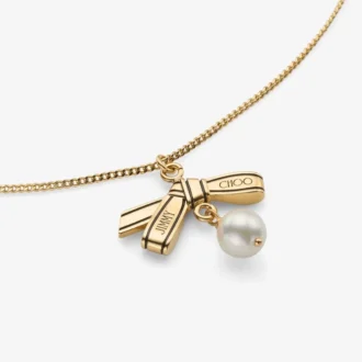 Ribbon-Anhänger-Halskette Goldfarbene Metall-Anhänger-Halskette mit Schleife und Perle