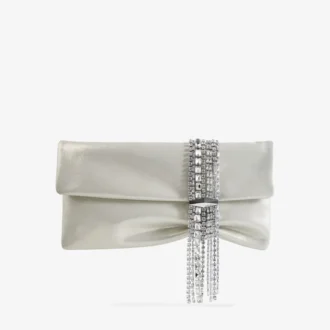 Zandra Clutch aus hellgold schimmerndem Wildleder mit Kettenarmband