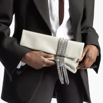 Zandra Clutch aus hellgold schimmerndem Wildleder mit Kettenarmband